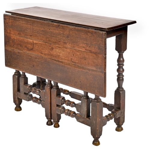 1116 - An oak credence table, late 18th c, with boarded top, turned legs and stretcher base, 73cm h; 90 x 3... 