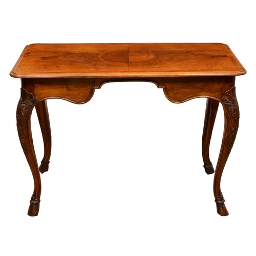 1117 - A French carved walnut writing table, early 20th c,  on cabriole legs with carved hoof feet, 79cm gl... 