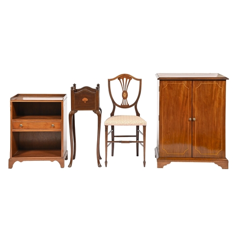 1121 - An Edwardian inlaid mahogany salon chair, with shield back and pierced splat, on  square tapering le... 