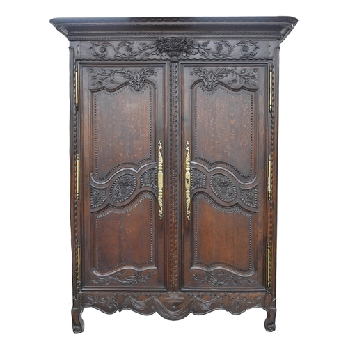 1125 - A Louis XVI French provincial carved walnut armoire, 227cm h; 160 x 64cm