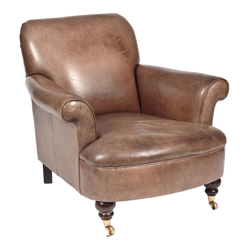 1159 - A mid 20th c brown leather armchair, turned mahogany front legs on brass castors, seat height 40cm, ... 