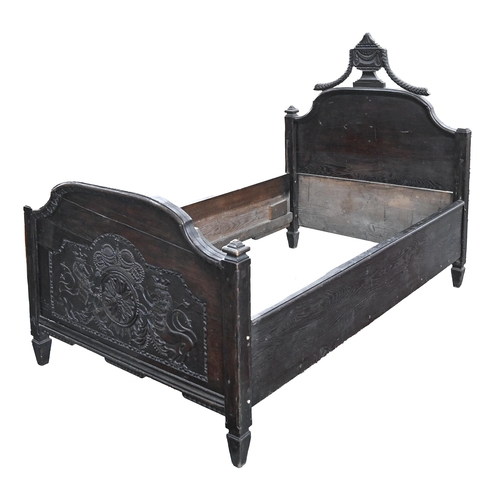 1164 - A Northern European carved oak bed, 170 x 107cm