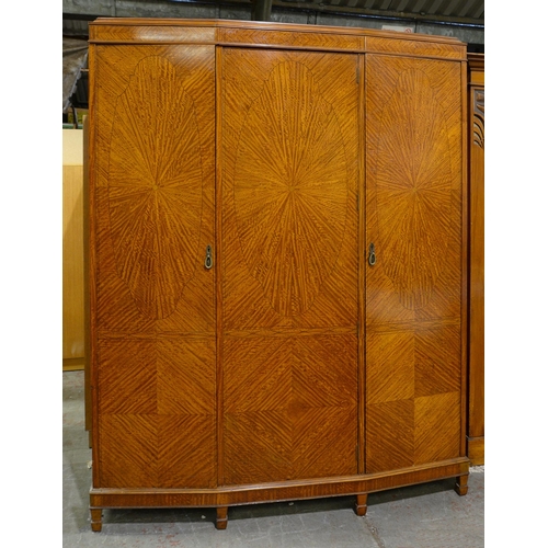 1187 - A satinwood and line inlaid spay fronted wardrobe, c1925, with radial veneers to the doors, 206cm h;... 