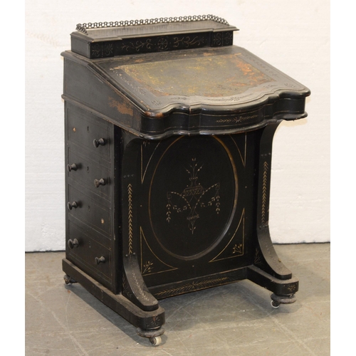 1194 - A Victorian ebonised davenport