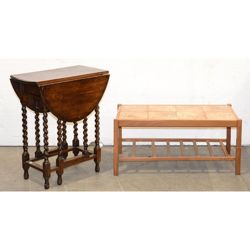 1198 - A tiled lightwood coffee table, 1970s, a stained oak gateleg table and a timber trunk labelled Cpt W... 