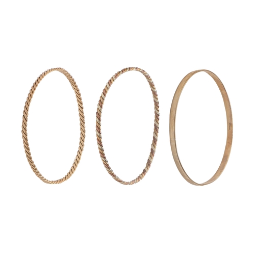 120 - Three 9ct gold bangles, 64mm diam, 26g