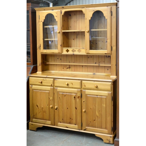 1211 - A waxed pine dresser, pedestal dining table with extending top and six chairs