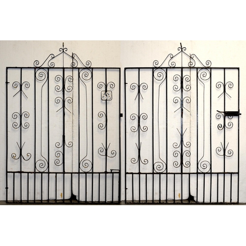 1217 - A pair of wrought ito gates, 217cm h, 153cm l (x2)