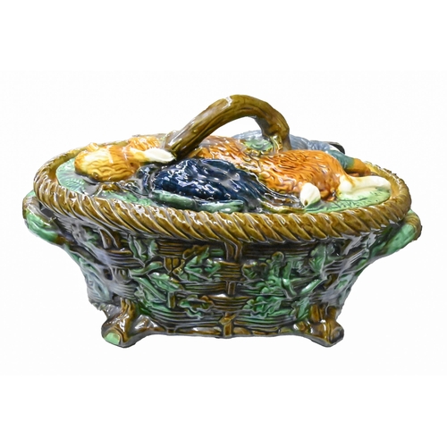 1255 - A reproduction majolica game pie dish and cover