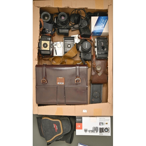 1331 - Miscellaneous cameras, lenses and accessories, to include Nikon and Canon, several boxed... 