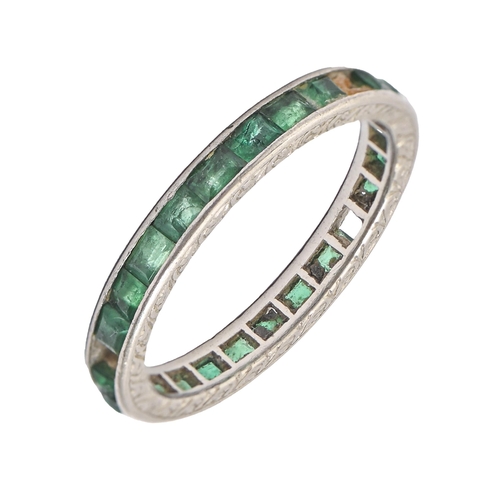 159 - An emerald eternity ring, the platinum mount set with calibre cut emeralds, 3.1 g, size N and a... 