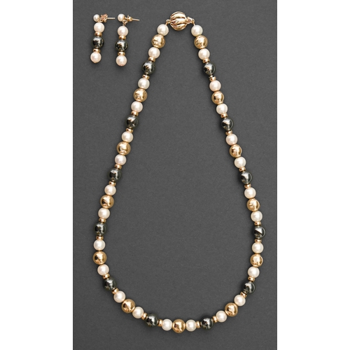 206 - A necklace of cultured pearls, 14ct gold and hematite beads, gold clasp, 43cm l and a pair of earrin... 