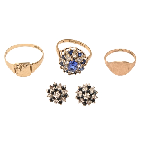 220C - A 9ct gold signet ring, a gold signet ring marked 9c, a blue and white paste ring in 9ct gold and a ... 