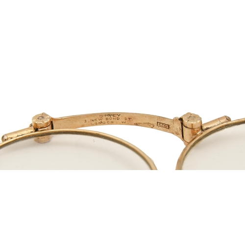 268 - A gold lorgnette, c1900, set with split pearls, 11.5cm l, marked on bridge DIXEY 3 NEW BOND ST LONDO... 