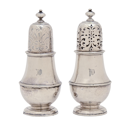 287 - A pair of George I silver casters and covers, one pierced, the other blind, contemporary initials on... 