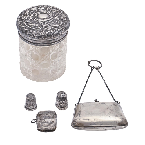 297 - An Edwardian cut glass powder jar with silver lid, Birmingham 1902, a silver vesta, Birmingham 1911,... 