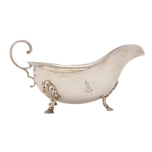 340 - A George V silver sauceboat, crested, 19.5cm l, by Harrison Brothers & Howson, London 1912,... 