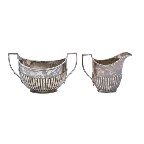 362 - An Edwardian silver cream jug and sucrier en suite, sucrier 90mm h, by W Hutton & Sons Ltd, Lond... 