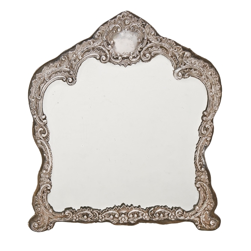 371 - An Edwardian rococo revival silver dressing mirror, with bevelled plate, 34cm h, by Henry Matthews, ... 