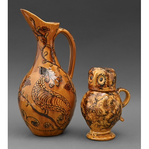 415 - Studio pottery. Carole Glover - Owl jug; Ewer, two, slipware, ewer 38.5cm h, incised signature... 