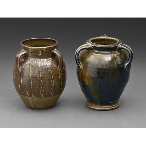 419 - Studio pottery. Three handled vases, two, stoneware with ash or streaky glaze, 20 and 21cm h, one wi... 