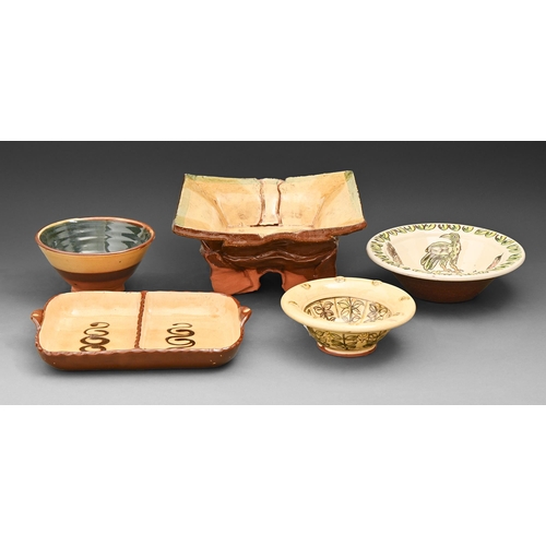 436 - Studio pottery. A divided dish and four bowls, slipware or glazed and painted earthenware, various s... 