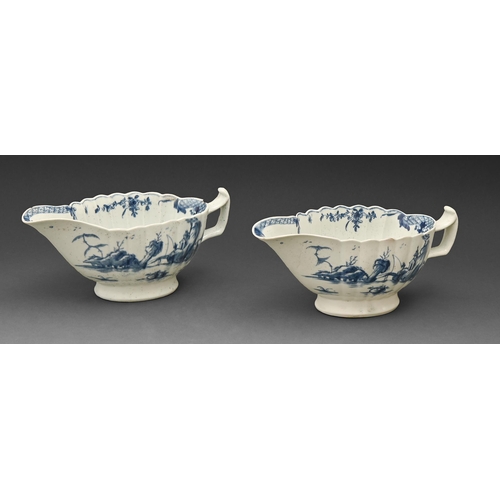 502 - Two Worcester blue and white sauceboats, c1758, of convex fluted shape and painted with the Fringed ... 