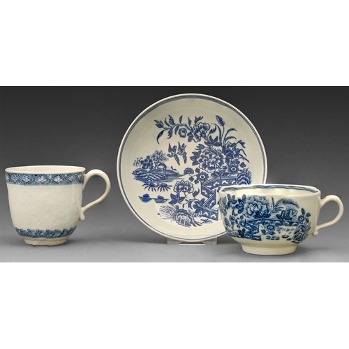 516 - A Worcester chrysanthemum moulded blue and white coffee cup, c1770, painted open crescent and a Worc... 