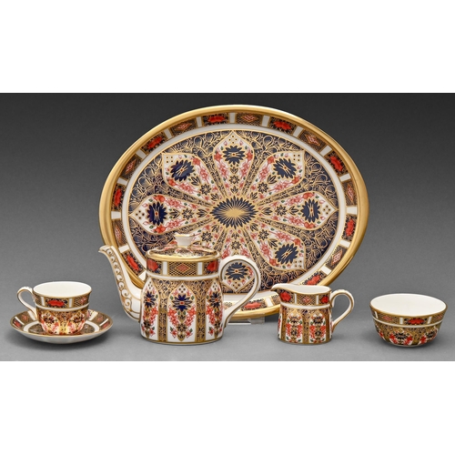 527 - A Royal Crown Derby Imari pattern miniature tea service, late 20th c, tray 19.5cm l, printed mark, b... 