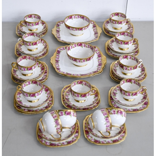 560 - A Royal Albert rose border tea service, printed mark