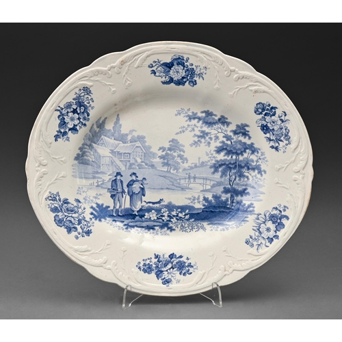 573 - A Staffordshire blue printed pearl ware Villager pattern moulded meat dish, early 19th c, 36.5cm l, ... 