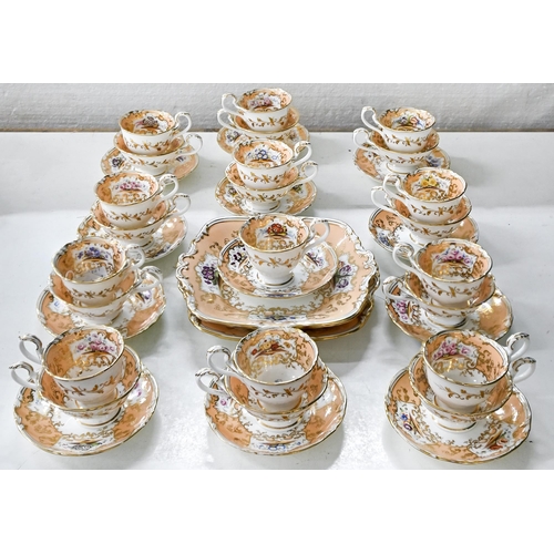 578 - A Coalport tea and coffee service, c1840, painted with a central rose and panels of flowers reserved... 