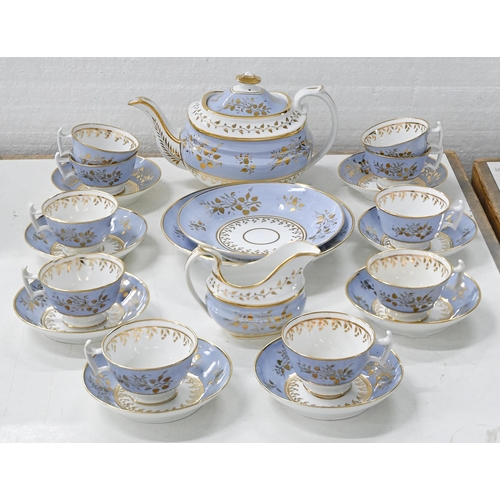 583 - A John Ridgway bone china tea and coffee service, c1820, decorated with gilt foliage on a lavender b... 