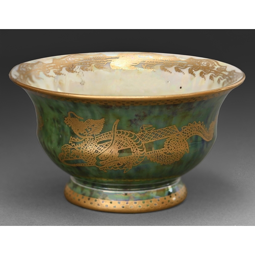 596 - A Wedgwood green ground Dragon Lustre cup, designed by Daisy Makeig Jones, c1920, 11.5cm diam, print... 