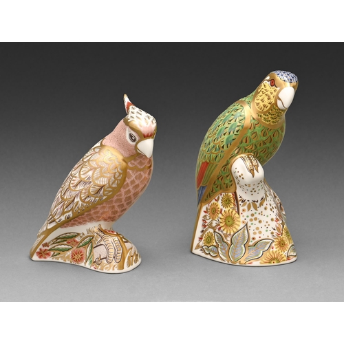 610 - Two Royal Crown Derby Amazon Green Parrot and Cockatoo paperweights, early 20th c, 13.5 and 15.5cm d... 