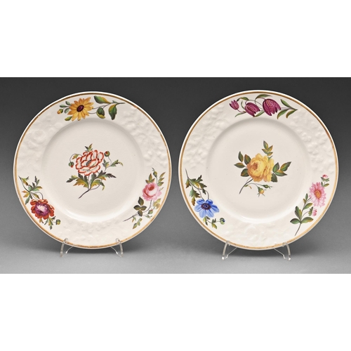 631 - A pair of Chamberlain's Worcester moulded dessert plates, c1825, painted with four flowers and gilt,... 