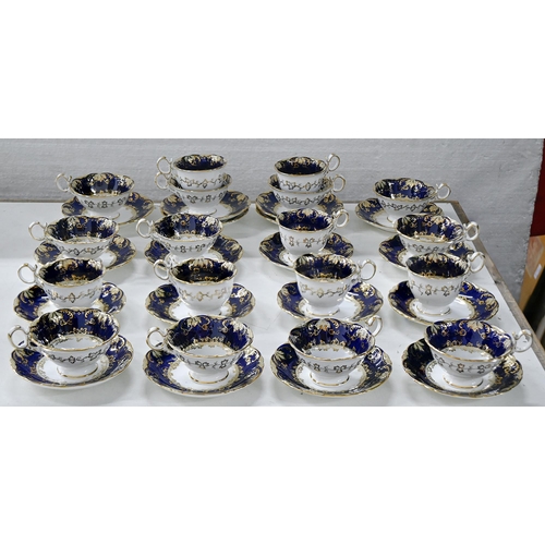 633 - A set of eleven Coalport teacups and seven coffee cups, c1840, Adelaide shape, in a blue and gilt bo... 