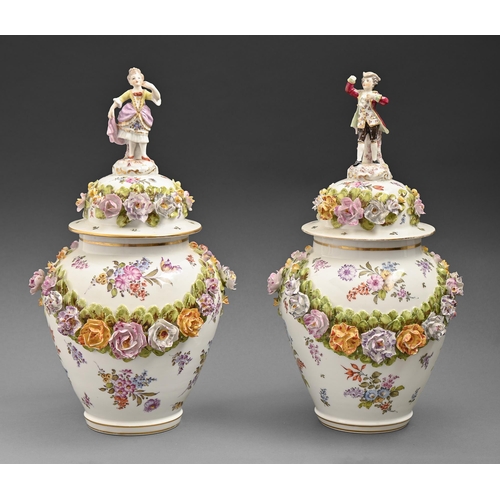 638 - A pair of Samson floral encrusted jars and covers, c1900, with boy or girl figural finial and festoo... 