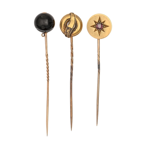 66 - A Victorian stickpin, with gypsy set garnet and gold terminal, reverse engraved AS LONG AS WE BOTH S... 