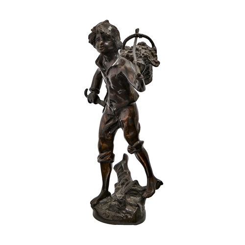 704 - A bronze sculpture of a bare foot French boy carrying a basket of fruit on a pole over his shoulder,... 