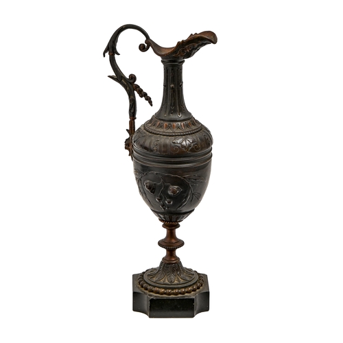 705 - A French ornamental bronze ewer, c1900, on polished slate base, 26.5cm h