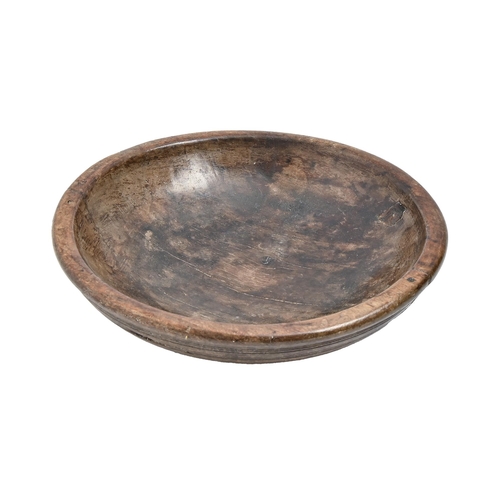 735 - Treen. An English turned sycamore nixing bowl, 19th c or earlier, 33.5cm diam