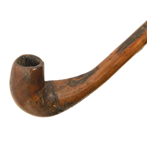 771 - A hollow wood tobacco pipe-cane, probably 19th c, 84cm l