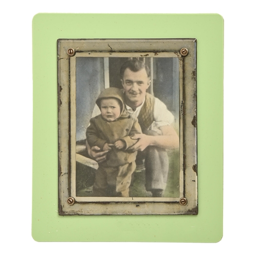 778 - An Art Deco opaque green glass photograph frame with mirror glass surround, c1940, 32.5 x 27.5cm... 