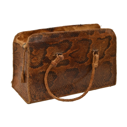 783 - A snakeskin holdall