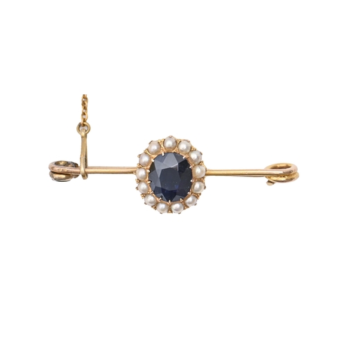 86 - A sapphire and split pearl brooch, in gold, on associated gold safety pin, 39mm l, marked 15, 3.2g... 