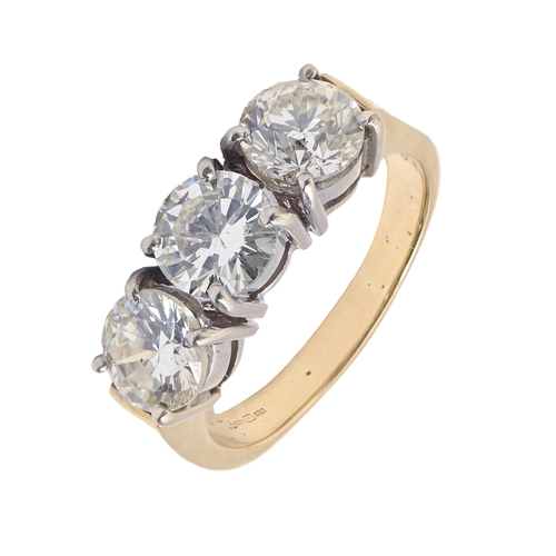 97 - A diamond ring, with round brilliant cut diamonds, in 18ct gold, Convention marked, 7.2g, size N... 