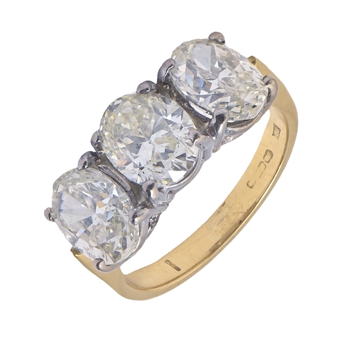 98 - A diamond ring, with three oval brilliant cut diamonds, in 18ct gold, Convention marked, 4g, size G... 