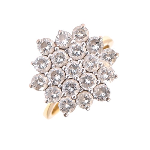 103 - A diamond ring, the round brilliant cut diamond of hexagonal cluster design, in 18ct gold, 6.6g size... 