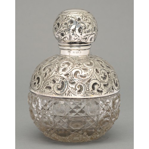 329A - An Edwardian silver mounted cut glass scent bottle, with screw cap, 13.5cm h, maker's mark rubbed, B... 